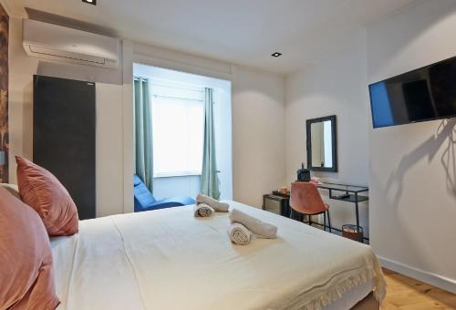 TV a/nebo společenská místnost v ubytování Hotel Les Ecrins