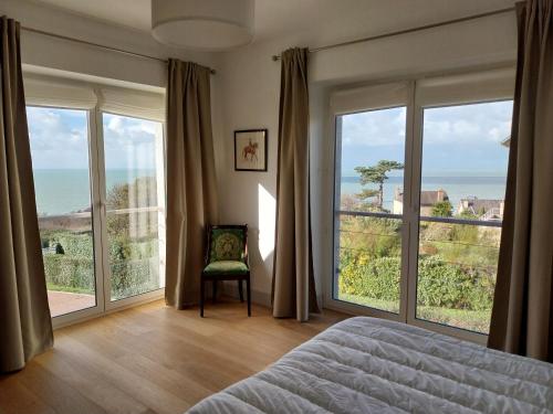 Ένα ή περισσότερα κρεβάτια σε δωμάτιο στο Villa Paqueray