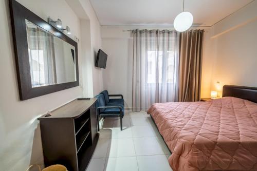 Ένα ή περισσότερα κρεβάτια σε δωμάτιο στο Heronissos Apartment