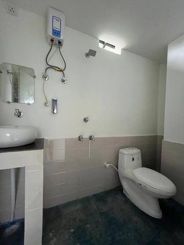 Een badkamer bij vaishnav cottage