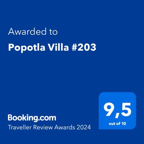 a blue screen with the text awarded to popula villa at Popotla Villa #203 in Divisadero