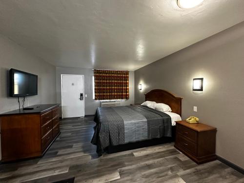 Katil atau katil-katil dalam bilik di Sunpark Inn & Suites