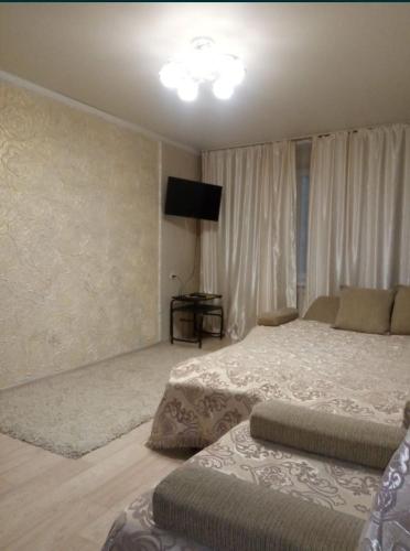 En eller flere senge i et værelse på 2х в Центре города