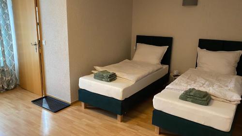 Posteľ alebo postele v izbe v ubytovaní Pension Altsprucke