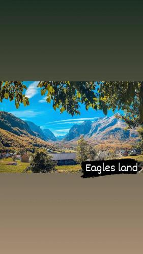 a view of a valley and a mountain range at Dedushi camping place in Vusanje
