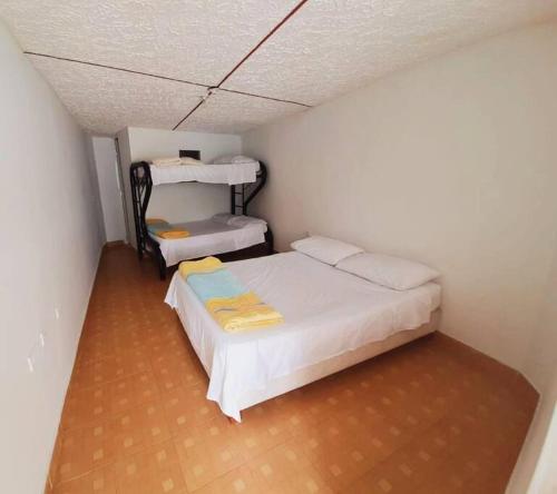 Postel nebo postele na pokoji v ubytování Hermosa Finca Privada