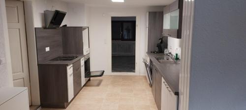 Kuchyň nebo kuchyňský kout v ubytování Ferienwohnung Scheuern