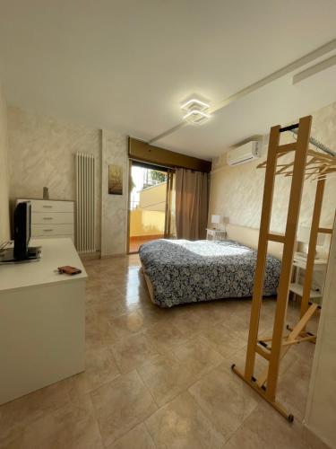 Ένα ή περισσότερα κρεβάτια σε δωμάτιο στο L'Orizzonte