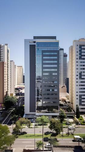 a large tall building in a city with buildings at Studio Helbor Stay Batel - Sofisticação, Conforto, Localização e Vista Privilegiada in Curitiba