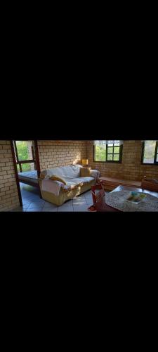 a room with two beds sitting on the floor at Sobrado com vista profissional do mar in Arroio do Sal