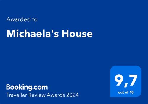 תעודה, פרס, שלט או מסמך אחר המוצג ב-Michaela's House