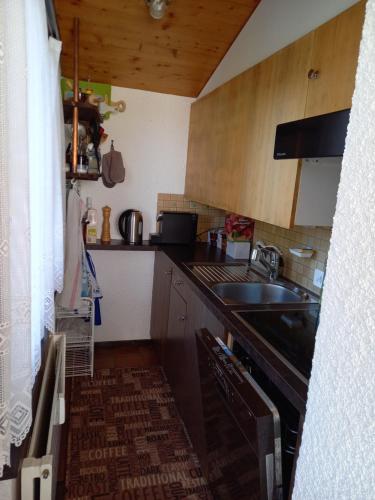 Virtuvė arba virtuvėlė apgyvendinimo įstaigoje Le Perchoir