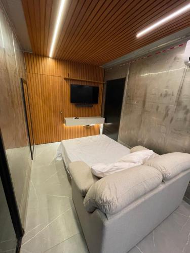 Televisyen dan/atau pusat hiburan di Ypê Flats e Containers