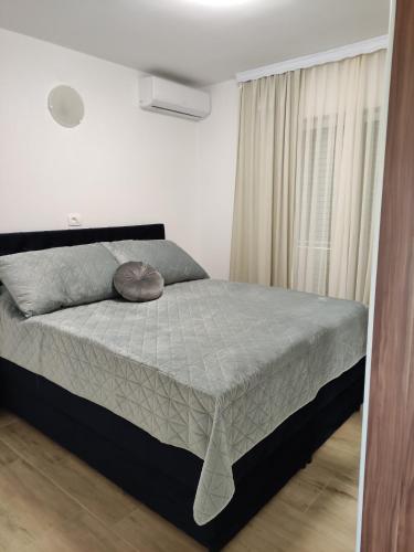 Cama ou camas em um quarto em Villa Oliva Korcula