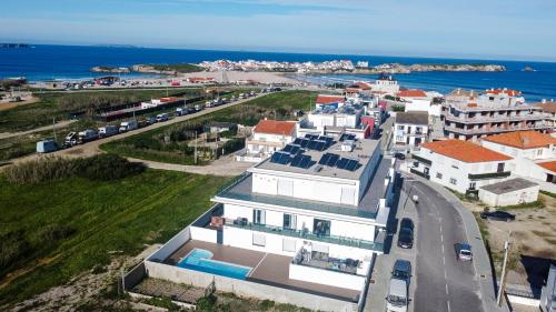 an aerial view of a house with the ocean at SAL Baleal in Baleal