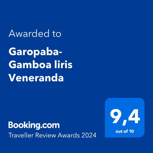 a screenshot of a cell phone with the text awarded to garapa gamba lifts at Garopaba - Praia da Gamboa - Apartamento com piscina in Garopaba