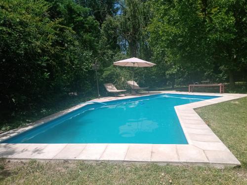 Piscina a La Chacrita o a prop