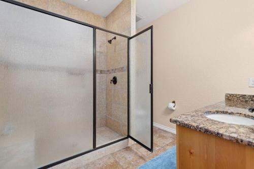 a bathroom with a shower and a sink at Cliff View #14 in New Braunfels