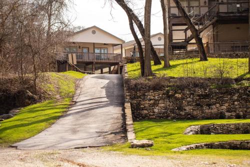 a walkway in front of a house with a building at Cliff View #14 in New Braunfels