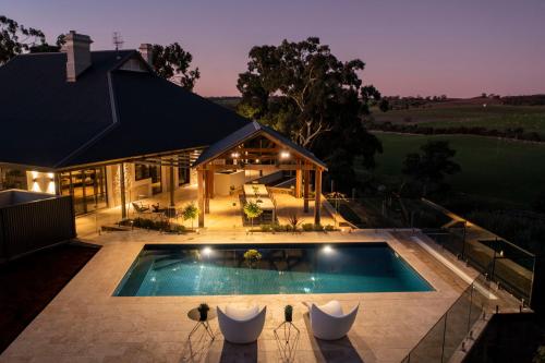 an aerial view of a house with a swimming pool at Gawler Park Estate in Angaston