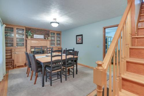 a dining room with a table and chairs at Large Home with Deck and Grill about 9 Mi to Virginia Tech in Christiansburg