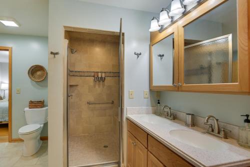 a bathroom with two sinks and a shower at Large Home with Deck and Grill about 9 Mi to Virginia Tech in Christiansburg