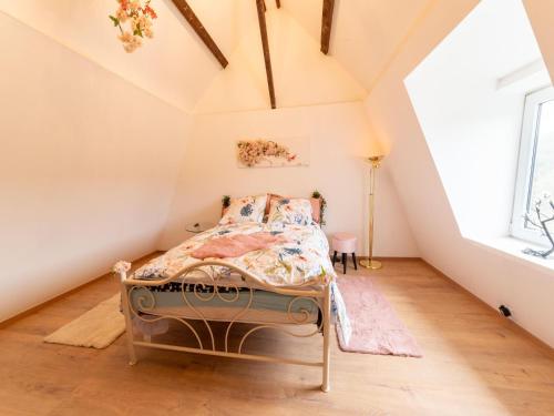 a bedroom with a bed in a attic at Charming Family Home in Esneux in Esneux