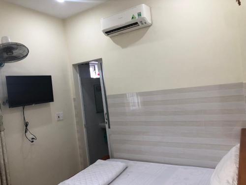 Postel nebo postele na pokoji v ubytování Homestay 05
