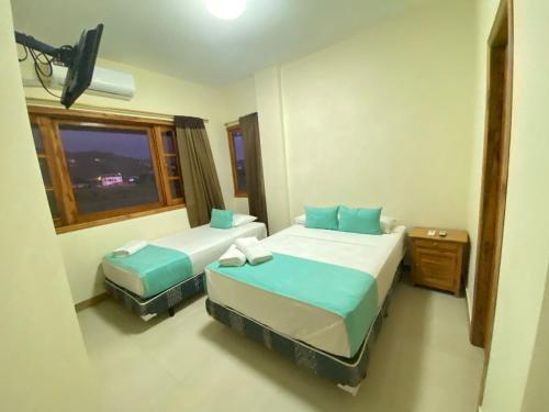 Кровать или кровати в номере Apartamento de PATTY