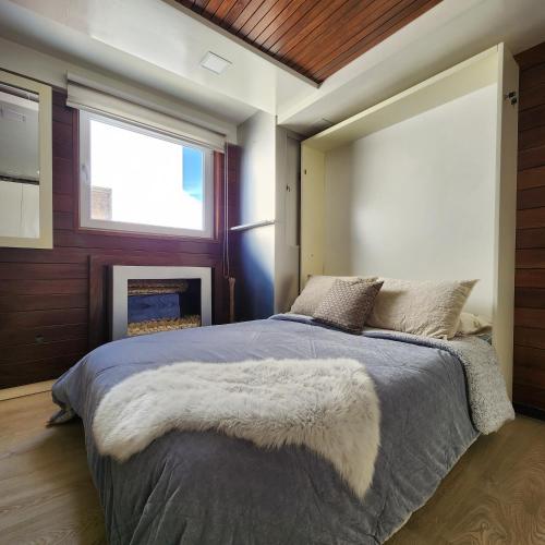 Кровать или кровати в номере Torre Bella apartment