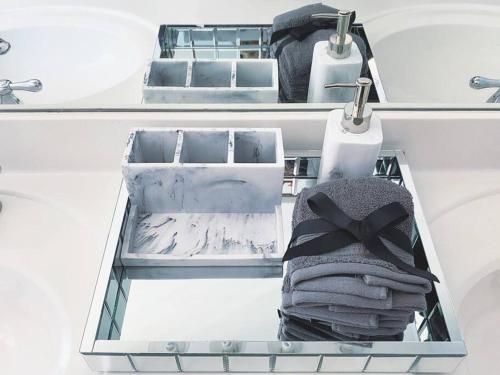 a drawer in a bathroom with towels in it at Entire Home Downtown ATL! Walk to GWCC and more! in Atlanta