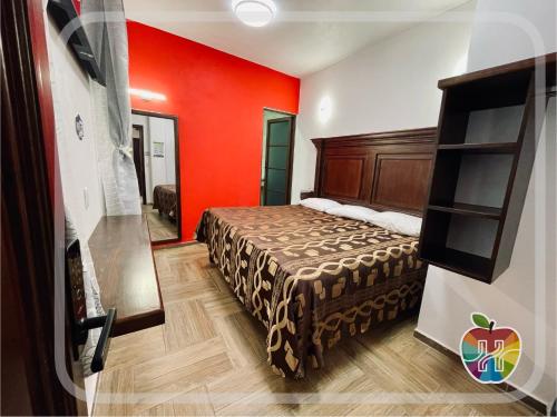 Voodi või voodid majutusasutuse HOTEL LA GRAN MANZANA toas
