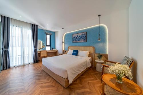 Ένα ή περισσότερα κρεβάτια σε δωμάτιο στο V Boutique Hotel - Complimentary refreshments