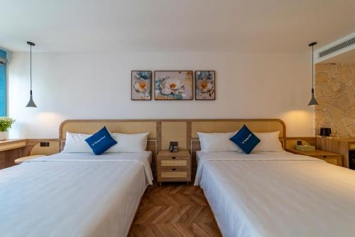 Ένα ή περισσότερα κρεβάτια σε δωμάτιο στο V Boutique Hotel - Complimentary refreshments