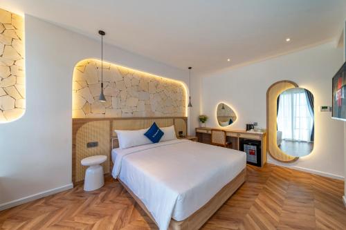 Ένα ή περισσότερα κρεβάτια σε δωμάτιο στο V Boutique Hotel - Complimentary refreshments