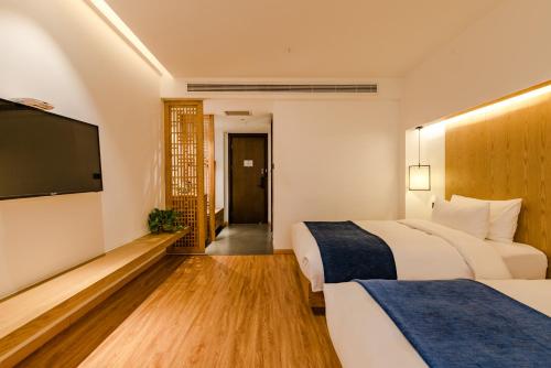 Mynd úr myndasafni af Supu Hotel - Zhengzhou CBD International Convention and Exhibition Center í Zhengzhou