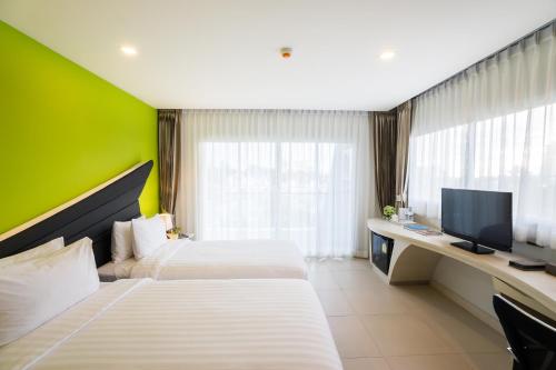 Televisyen dan/atau pusat hiburan di Blue Boat Hotel JC