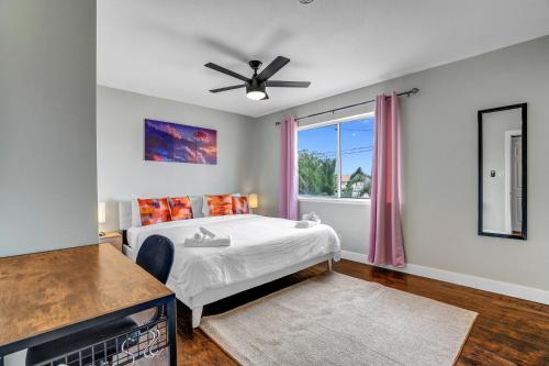 a bedroom with a bed and a window at Family Reunion, Remodeled, King Beds, X-box, Desks in Las Vegas