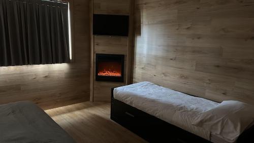 Ένα ή περισσότερα κρεβάτια σε δωμάτιο στο Anemone Bianco Suite Rooms