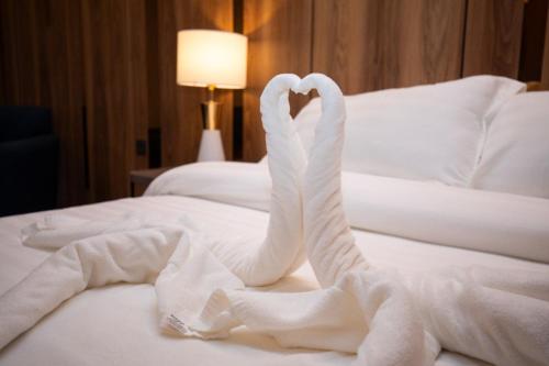 Cama ou camas em um quarto em فندق ماسة المشاعر الفندقية