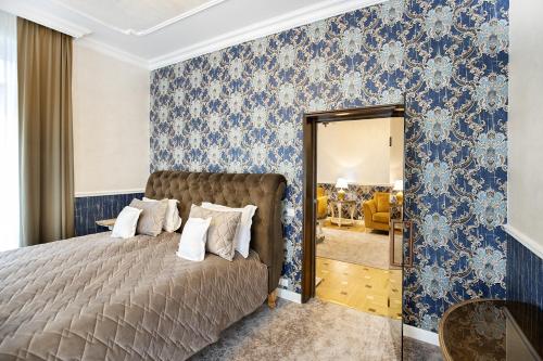 Кровать или кровати в номере Hotel Palace