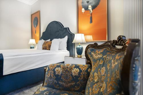 Кровать или кровати в номере Hotel Palace