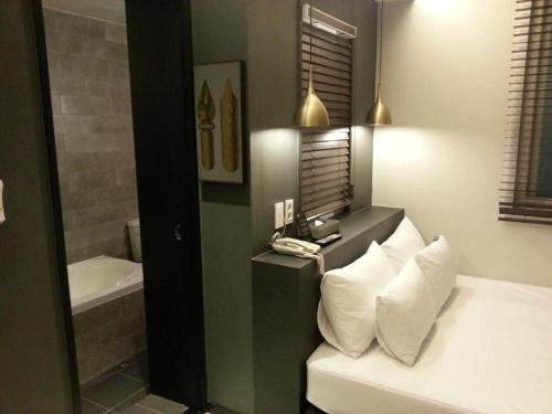Et badeværelse på Hi Design Hotel