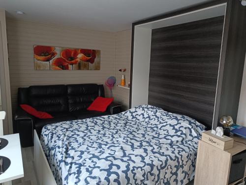 Postel nebo postele na pokoji v ubytování Appartement Studio Wenduine