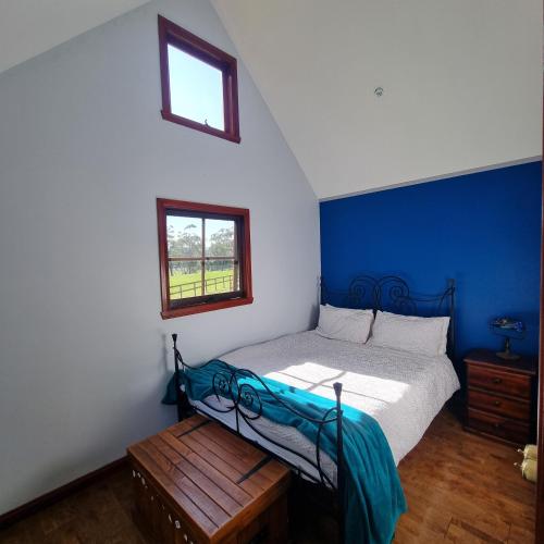Voodi või voodid majutusasutuse Giyabwe Cottage toas