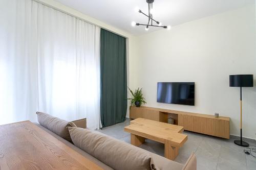 Μια τηλεόραση ή/και κέντρο ψυχαγωγίας στο INOHO Fern Apartment