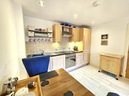 Η κουζίνα ή μικρή κουζίνα στο George Hudson Court Apartments