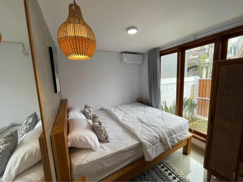 Кровать или кровати в номере LaKalena Private Villa Sanur Bali