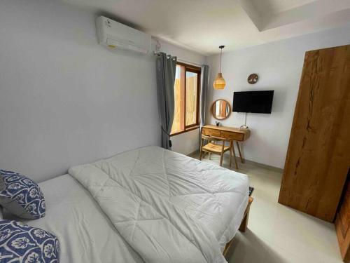 Кровать или кровати в номере LaKalena Private Villa Sanur Bali