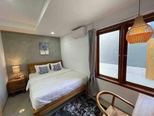 Кровать или кровати в номере LaKalena Private Villa Sanur Bali
